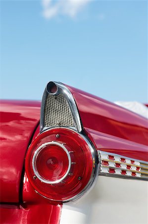 close up of 1960s red convertible car in Cuba. Vertical shape, copy space Foto de stock - Super Valor sin royalties y Suscripción, Código: 400-04401430