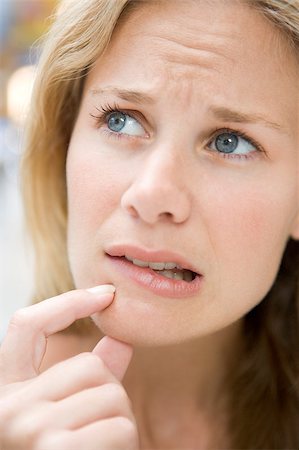 Head shot of worried woman Stock Photo - Budget Royalty-Free & Subscription, Code: 400-04401641