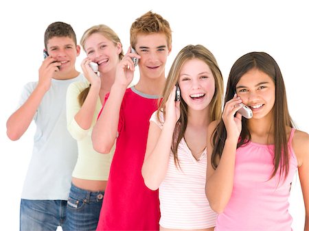 simsearch:400-04402293,k - Row of five friends on cellular phones smiling Stock Photo - Budget Royalty-Free & Subscription, Code: 400-04402294