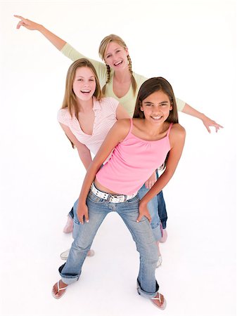 simsearch:400-04402293,k - Three girl friends in a row smiling Stock Photo - Budget Royalty-Free & Subscription, Code: 400-04402290