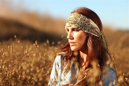 Young Beautiful Woman in a Field During Summertime Stock Photo - Budget Royalty-Free & Subscription, Code: 400-04402427
