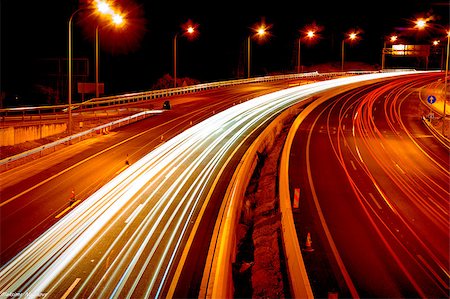 night photography highway with car lights trails showing dynamic movement in a static decision Stock Photo - Budget Royalty-Free & Subscription, Code: 400-04402498