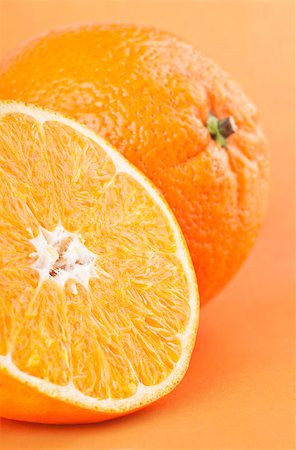 simsearch:400-05381130,k - Closeup of ripe orange and its half Stock Photo - Budget Royalty-Free & Subscription, Code: 400-04402647