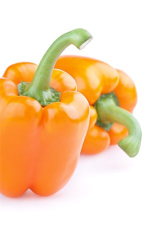 simsearch:400-05672477,k - Two orange peppers isolated on white Photographie de stock - Aubaine LD & Abonnement, Code: 400-04402682