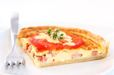 Tradition French bacon quiche with onion, tomato and cheese Stock Photo - Budget Royalty-Free & Subscription, Code: 400-04403348