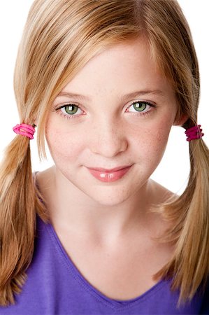 simsearch:400-05131187,k - Beautiful cute sincere face of happy teenager girl with pigtails, blond hair, green eyes and freckles, isolated. Foto de stock - Super Valor sin royalties y Suscripción, Código: 400-04403642