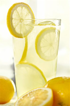 tall glass of lemonade with lemon garnish. Stock Photo - Budget Royalty-Free & Subscription, Code: 400-04414124