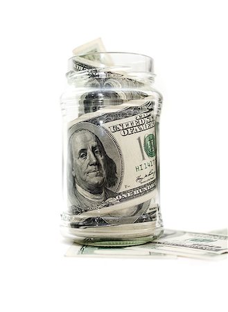 simsearch:693-06021333,k - dollars in money jar isolated on white background Stock Photo - Budget Royalty-Free & Subscription, Code: 400-04414751