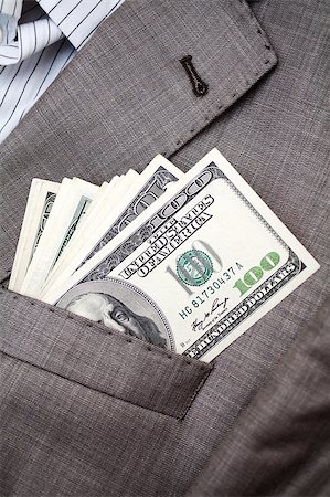 expensive formal men wear - one hundred dollars in the pocket of business suit Stock Photo - Budget Royalty-Free & Subscription, Code: 400-04414761