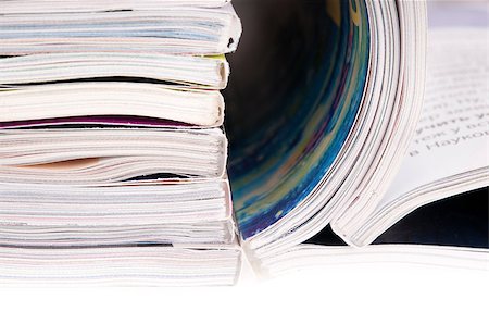 simsearch:400-06568755,k - Closeup background of a pile of magazines with bending pages Stock Photo - Budget Royalty-Free & Subscription, Code: 400-04415263