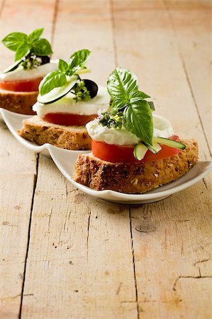 petals milk - photo of delicious sliced cereal bread with tomato mozzarella Stock Photo - Budget Royalty-Free & Subscription, Code: 400-04416734