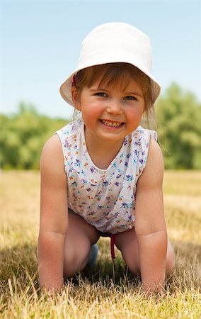 small babies in park - Little adorable girl posing in the park Stock Photo - Budget Royalty-Free & Subscription, Code: 400-04416792