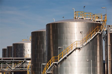 solar energy - Large tanks in the chemical factory Photographie de stock - Aubaine LD & Abonnement, Code: 400-04416965