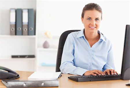 simsearch:400-04894274,k - Businesswoman posing in her office Stock Photo - Budget Royalty-Free & Subscription, Code: 400-04417271