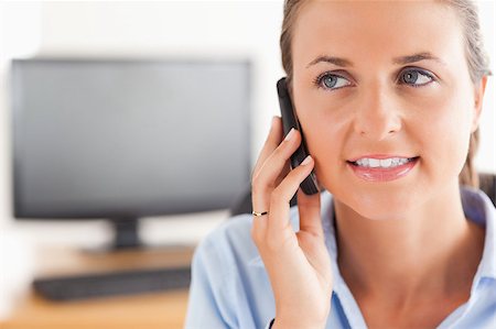 simsearch:400-04008684,k - Close up of a working woman on the phone in her office Stockbilder - Microstock & Abonnement, Bildnummer: 400-04417317