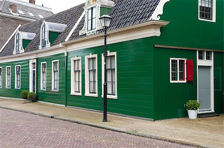 typical dutch houses in the Zaanse Schans north to Amsterdam Foto de stock - Super Valor sin royalties y Suscripción, Código: 400-04417844