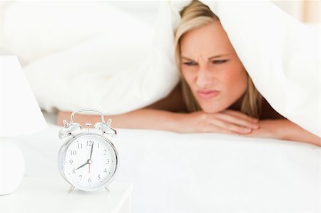 simsearch:6109-06194402,k - Dissatisfied woman waking up in her bedroom Stock Photo - Budget Royalty-Free & Subscription, Code: 400-04418608