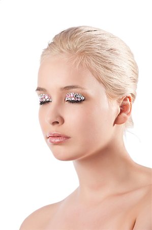 simsearch:400-04420197,k - very cute blond young woman with hair style with some shining gem stone on her eyes as a creative make up Foto de stock - Super Valor sin royalties y Suscripción, Código: 400-04419653