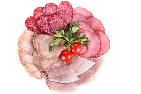 Splitting of sausages and meat dishes with tomatoes. Stock Photo - Budget Royalty-Free & Subscription, Code: 400-04419837