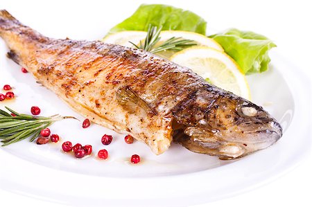 Fried body fish, lemon and berries. background. Stock Photo - Budget Royalty-Free & Subscription, Code: 400-04419841