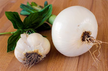 Basil onion and garlic over a wooden background Stock Photo - Budget Royalty-Free & Subscription, Code: 400-04419888