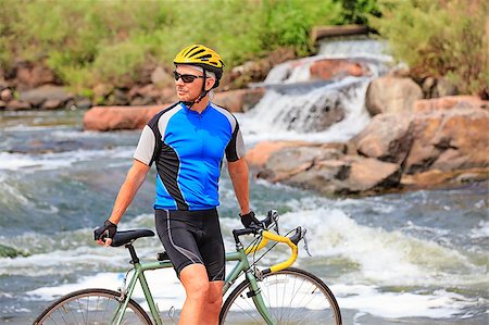 Bike rider by the river Stock Photo - Budget Royalty-Free & Subscription, Code: 400-04410076