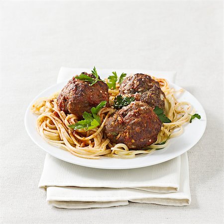 spaghetti and meatballs with copyspace. Shot with selective focus on meatballs. Stock Photo - Budget Royalty-Free & Subscription, Code: 400-04410261