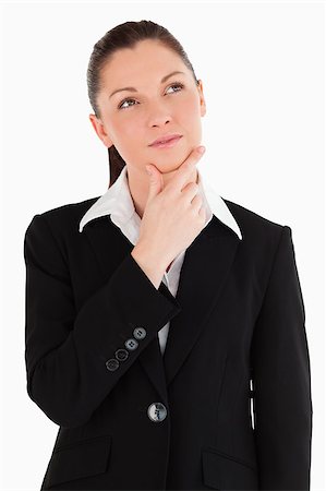 simsearch:400-07464688,k - Lovely woman in suit posing while standing against a white background Photographie de stock - Aubaine LD & Abonnement, Code: 400-04411296