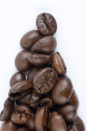 simsearch:400-05112254,k - Coffee beans forming triangle on white background Stockbilder - Microstock & Abonnement, Bildnummer: 400-04411590