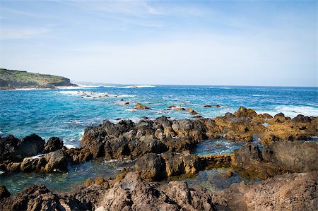 simsearch:400-07321918,k - Rocks in the foreground and the beautiful horizon in the background in Tenerife, Spain Stock Photo - Budget Royalty-Free & Subscription, Code: 400-04411809