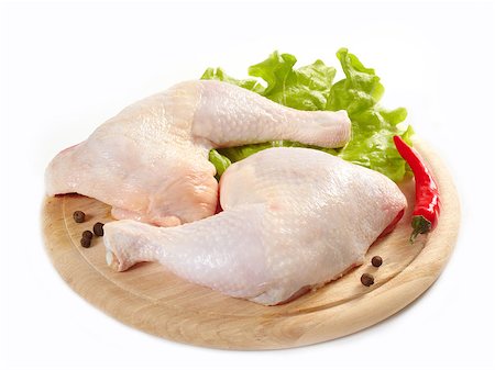 raw chicken on cutting board - fresh raw chicken legs on wooden cutting board Stock Photo - Budget Royalty-Free & Subscription, Code: 400-04413168