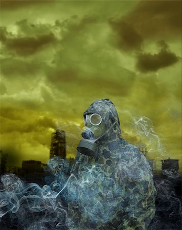 the man in anti-gas mask on a factory background Stock Photo - Budget Royalty-Free & Subscription, Code: 400-04424484