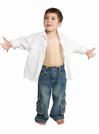 Toddler boy wearing blue jeans and white shirt stands with arms outstretched. Stock Photo - Budget Royalty-Free & Subscription, Code: 400-04425385