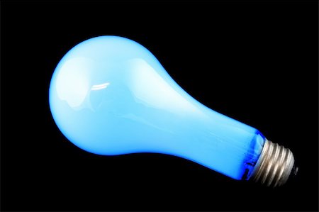 simsearch:640-01354128,k - Bright Blue Light Bulb on Isolated Black Background Photographie de stock - Aubaine LD & Abonnement, Code: 400-04425555