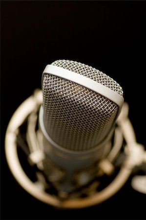 elvis stage - song microphone on black background Stock Photo - Budget Royalty-Free & Subscription, Code: 400-04426367