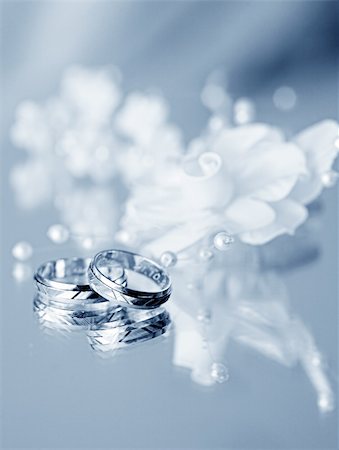 simsearch:400-04574409,k - weddings rings on reflecting blue background Stock Photo - Budget Royalty-Free & Subscription, Code: 400-04426471