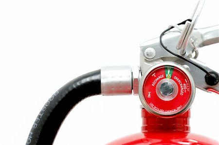 presurizado - fire extinguisher fully charged. a highkey closeup over white with focus on pressure gauge  note: brand name removed, text on hose only indicatative of type of hose Foto de stock - Super Valor sin royalties y Suscripción, Código: 400-04426524
