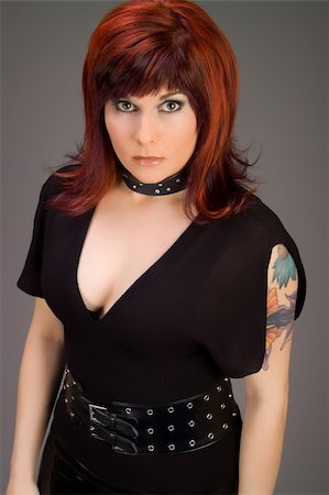 simsearch:400-07549730,k - Female redhead with tattoo in elegant black goth fashion Stock Photo - Budget Royalty-Free & Subscription, Code: 400-04427524