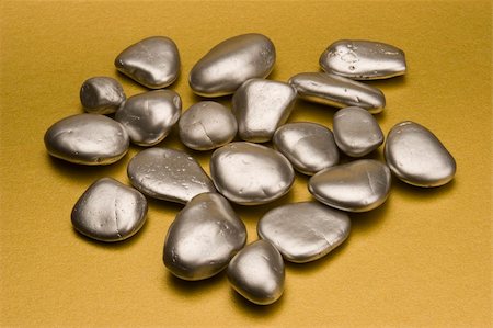 Silver pebbles against a gold background Stock Photo - Budget Royalty-Free & Subscription, Code: 400-04428566