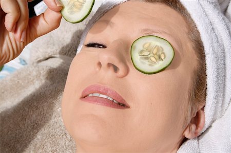 funny wellness healthcare - woman taking car of her face after spa. Stock Photo - Budget Royalty-Free & Subscription, Code: 400-04428773