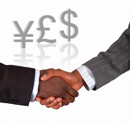 simsearch:400-03956950,k - This is an image of two businessmen performing a handshake, celebrating a completed deal. Foto de stock - Royalty-Free Super Valor e Assinatura, Número: 400-04428782