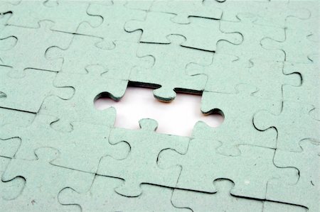 simsearch:640-01355058,k - Close up of a Jigsaw with elements missing Photographie de stock - Aubaine LD & Abonnement, Code: 400-04428911