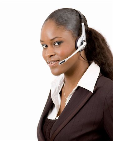 This is a close-up image of a female call operator. This image can be used for telecommunication and service themes. (Editted over white for easy clipping) Foto de stock - Royalty-Free Super Valor e Assinatura, Número: 400-04428967