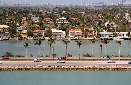 Miami Floriday Landscape with Roadway and Expensive Homes Stock Photo - Budget Royalty-Free & Subscription, Code: 400-04429153