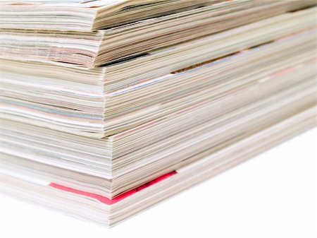 Stack of magazines isolated on a white background Stockbilder - Microstock & Abonnement, Bildnummer: 400-04429260