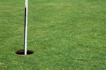 simsearch:400-03975619,k - golf hole with white post, playing field Stock Photo - Budget Royalty-Free & Subscription, Code: 400-04429453