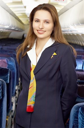 simsearch:625-00805855,k - air hostress in the empty airliner cabin Stock Photo - Budget Royalty-Free & Subscription, Code: 400-04429524