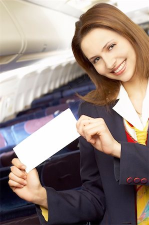 simsearch:400-04429524,k - air hostess (stewardess) in the empty airliner cabin Stock Photo - Budget Royalty-Free & Subscription, Code: 400-04429526