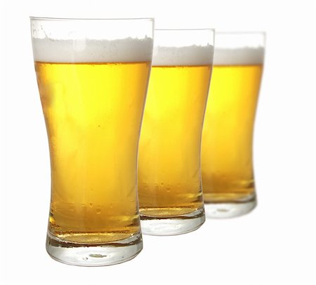 simsearch:400-05123651,k - Three glases of beer against white background Foto de stock - Royalty-Free Super Valor e Assinatura, Número: 400-04429567