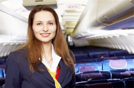 simsearch:400-04429524,k - air hostess (stewardess) in the empty airliner cabin Stock Photo - Budget Royalty-Free & Subscription, Code: 400-04429589